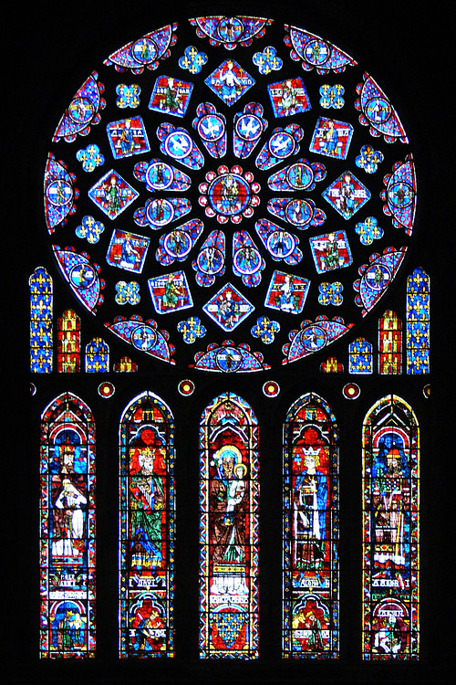 Figure 1: The North Rose window of Chartres Cathedral, France, 1190-1220 CE. The stained glass window shows scenes of Jesus Christ, the prophets and 12 kings of Judah.